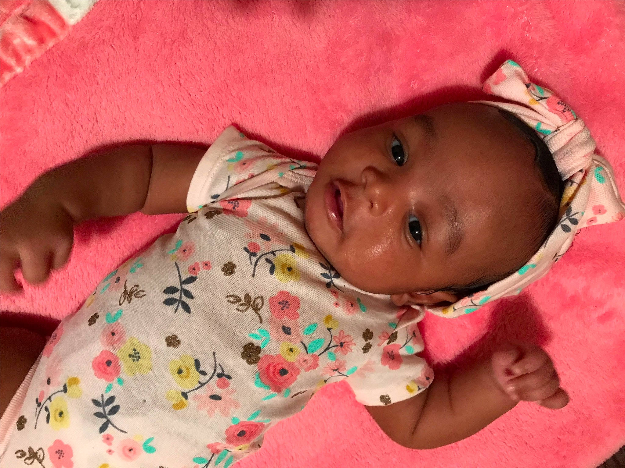 Jashiya is registered to the contest to win money with this photo: baby, baby_toddler_clothing, cheek, child, eye, face, finger, hand, happy, head, human_body, iris, lip, mouth, nose, person, pink, skin, sleeve, textile