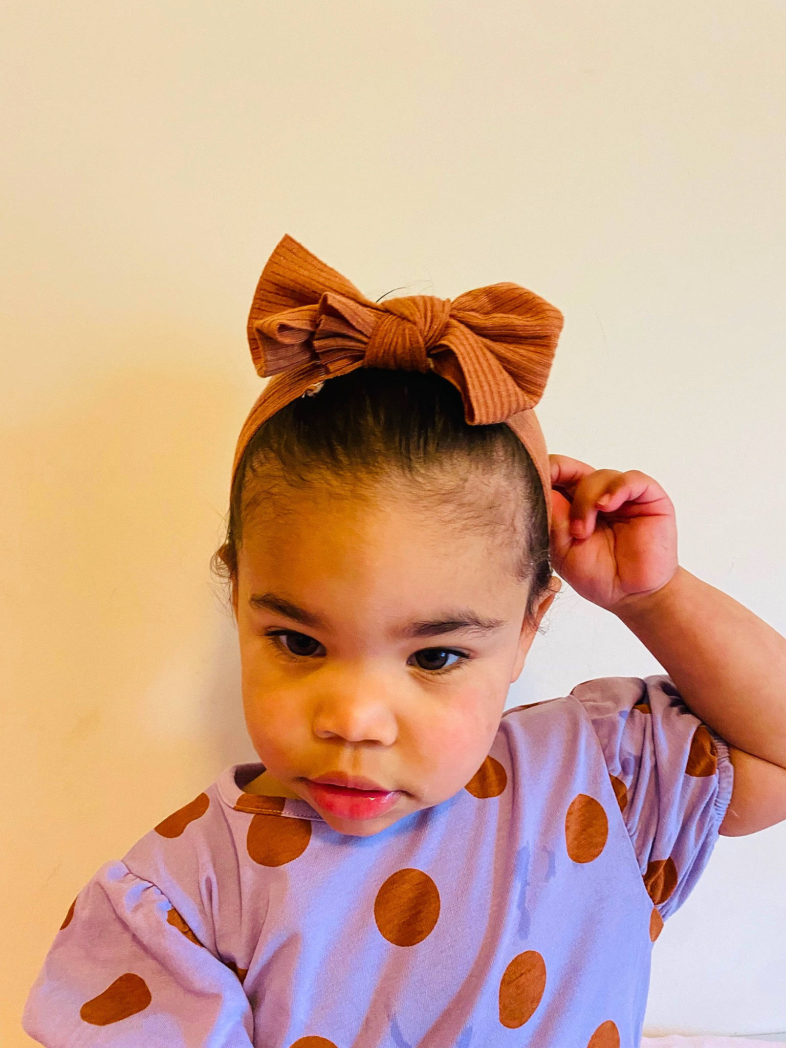 Avery is registered to the contest to win money with this photo: baby_toddler_clothing, costume, costume_hat, ear, eyebrow, eyelash, fashion_accessory, fashion_design, gesture, hair_accessory, hair_coloring, hair_tie, happy, headband, headpiece, jewellery, magenta, neck, person, sleeve