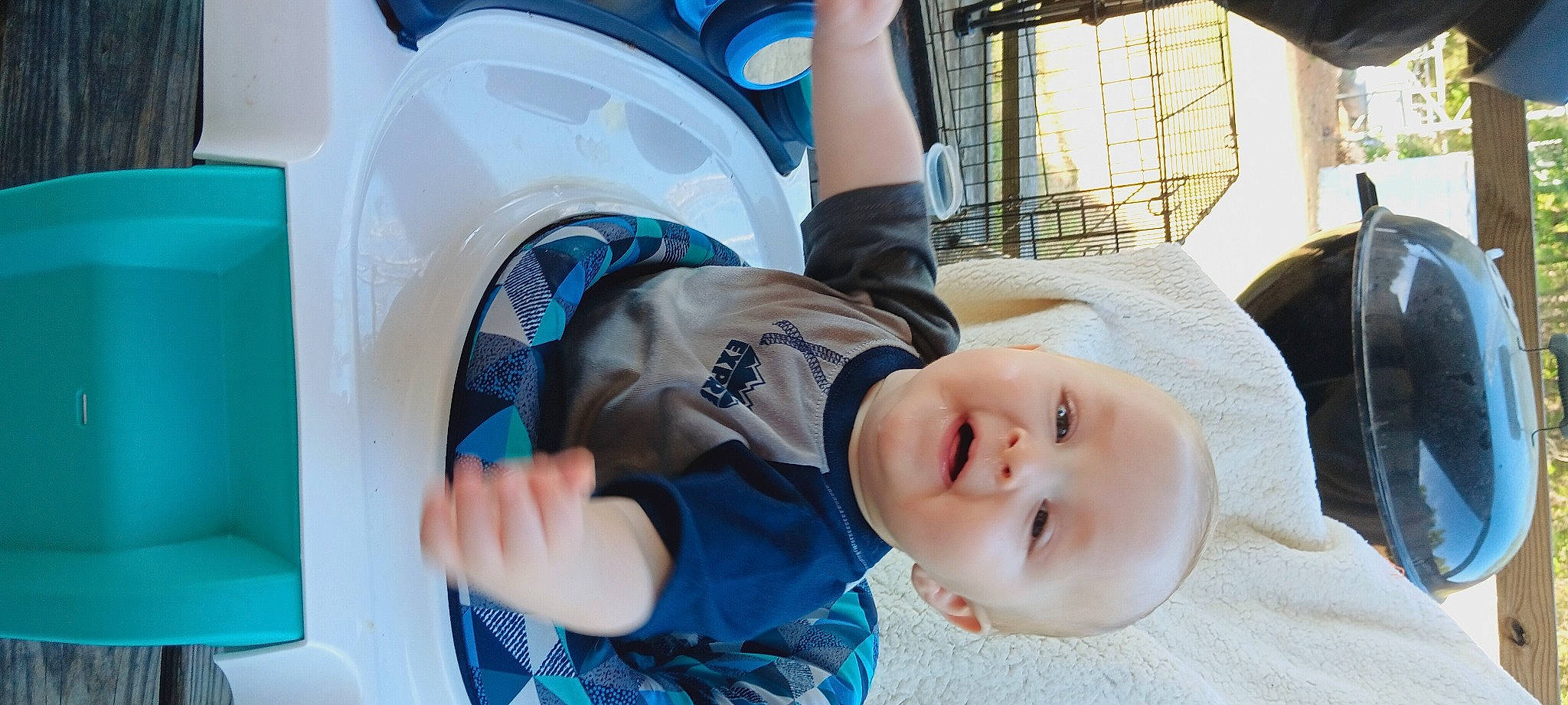 Clyde joined the competition — help win amazing prizes! auto_part, baby, baby_products, baby_toddler_clothing, blue, child, comfort, electric_blue, fun, grass, happy, leisure, person, plant, recreation, sitting, smile, toddler, tree, vehicle_door