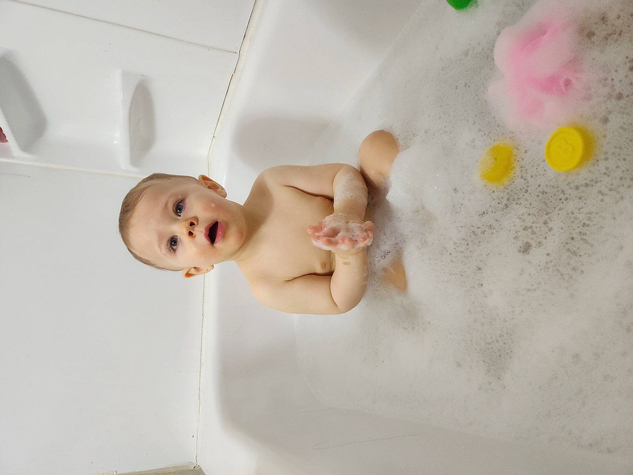 Sterling is registered to the contest to win money with this photo: art, baby, baby_products, bathing, bathtub, cheek, chest, child, comfort, finger, flooring, fun, happy, person, plumbing, product, room, skin, smile, stomach