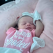 Samira joined the competition — help win amazing prizes! baby, newborn, sleeping, pink_clothing, mittens, pillow, cushion, infant, cute, peaceful, indoors, portrait, resting, soft_texture, headband, child, toddler, blanket, sleep, babywear