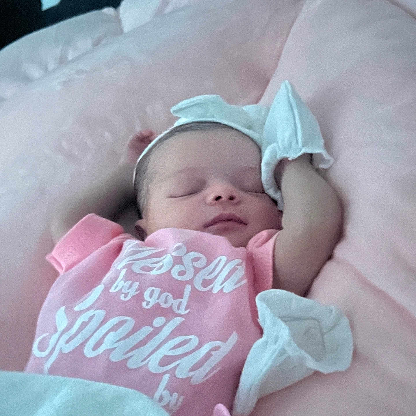 Samira joined the competition — help win amazing prizes! baby, newborn, sleeping, pink_clothing, mittens, pillow, cushion, infant, cute, peaceful, indoors, portrait, resting, soft_texture, headband, child, toddler, blanket, sleep, babywear