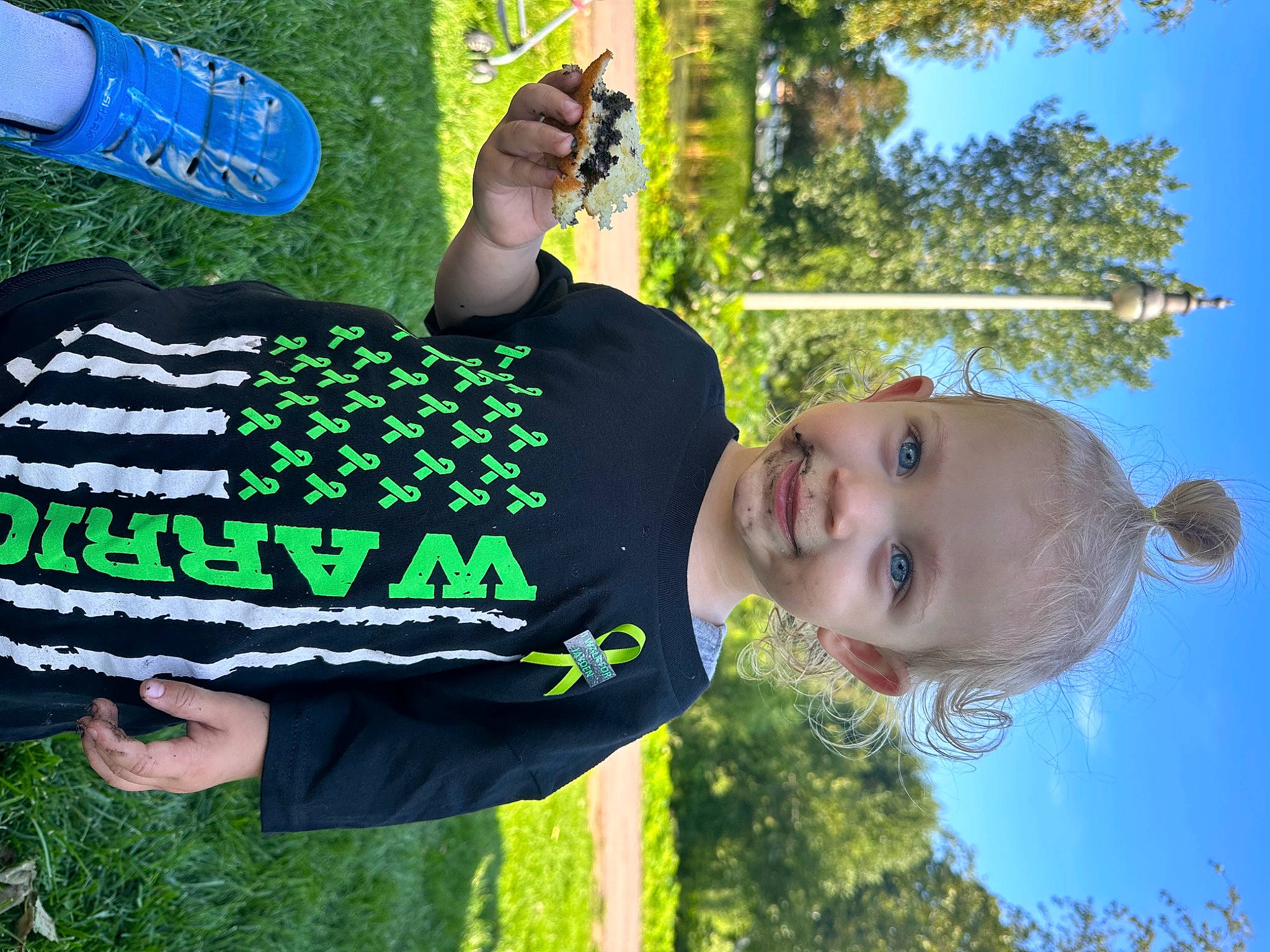 Lily Ann joined the competition — help win amazing prizes! blue, cool, finger, fun, gesture, grass, green, happy, joy, leaf, leisure, light, morning, people_in_nature, person, photograph, sky, smile, summer, t_shirt
