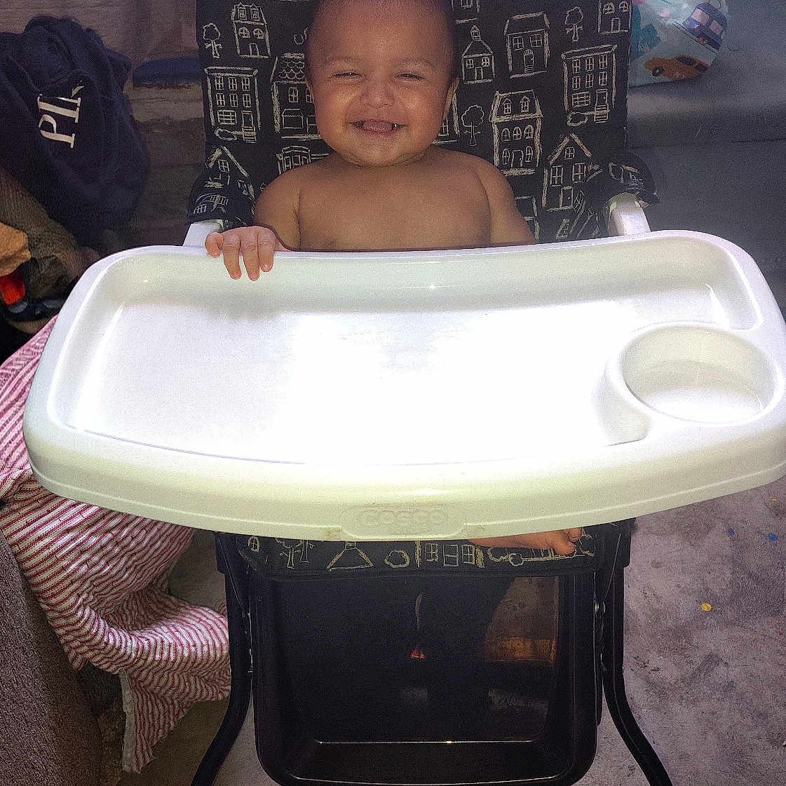 Alexander joined the competition — help win amazing prizes! baby, child, high_chair, smiling, grinning, toothy_smile, seated, indoor, portrait, infant, happy, face, bare_shoulders, tray, furniture, patterned_chair, home, carpet, curtain, candid_photo