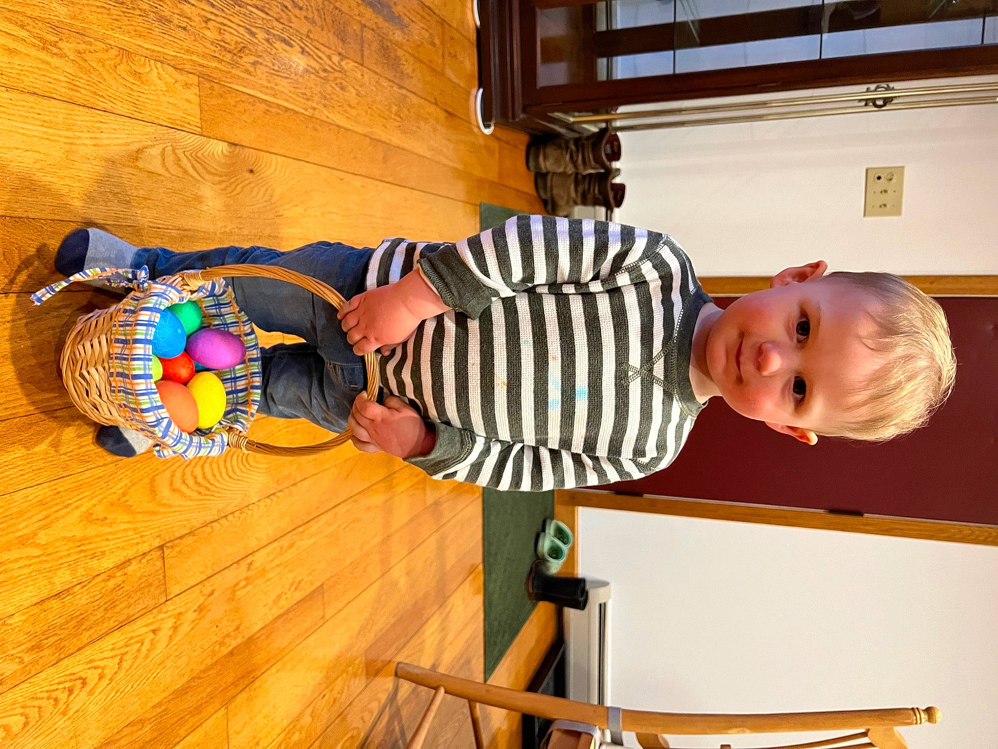 Rowen is registered to the contest to win money with this photo: baby, baby_toddler_clothing, child, eye, flooring, fun, happy, hardwood, laminate_flooring, person, play, room, smile, t_shirt, toddler, vacation, varnish, wood, wood_flooring, wood_stain