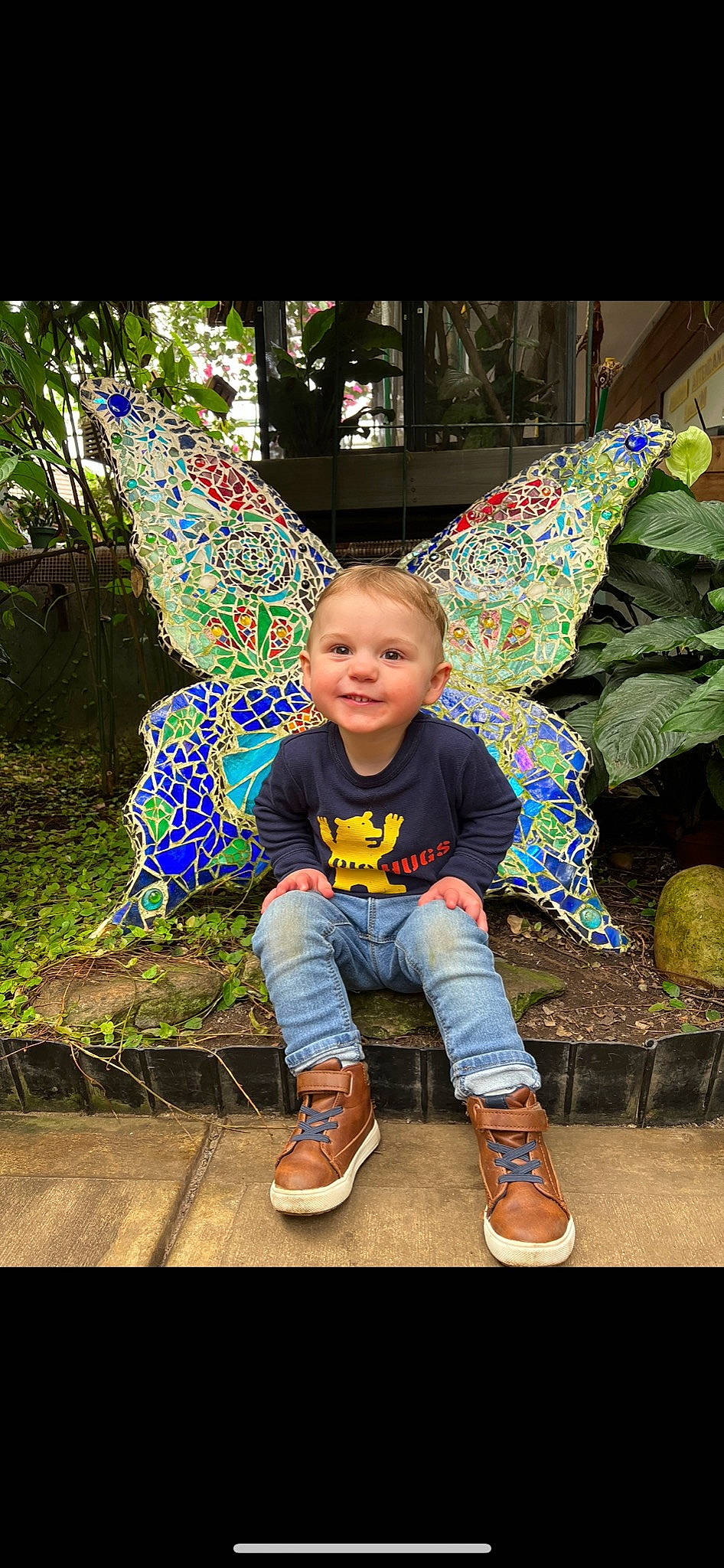 Rowen is registered to the contest to win money with this photo: boot, flash_photography, footwear, fun, grass, happy, joy, leaf, leg, leisure, magenta, pattern, people_in_nature, person, photograph, plant, sitting, smile, stock_photography, tints_and_shades