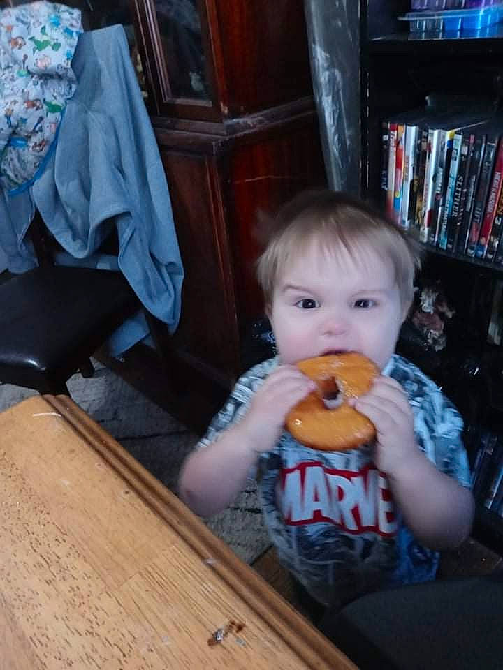 Troy joined the competition — help win amazing prizes! baby, baby_toddler_clothing, bookcase, cabinetry, chair, cheek, child, drawer, flooring, fun, hardwood, mammal, person, shelf, shelving, sitting, table, toddler, varnish, wood