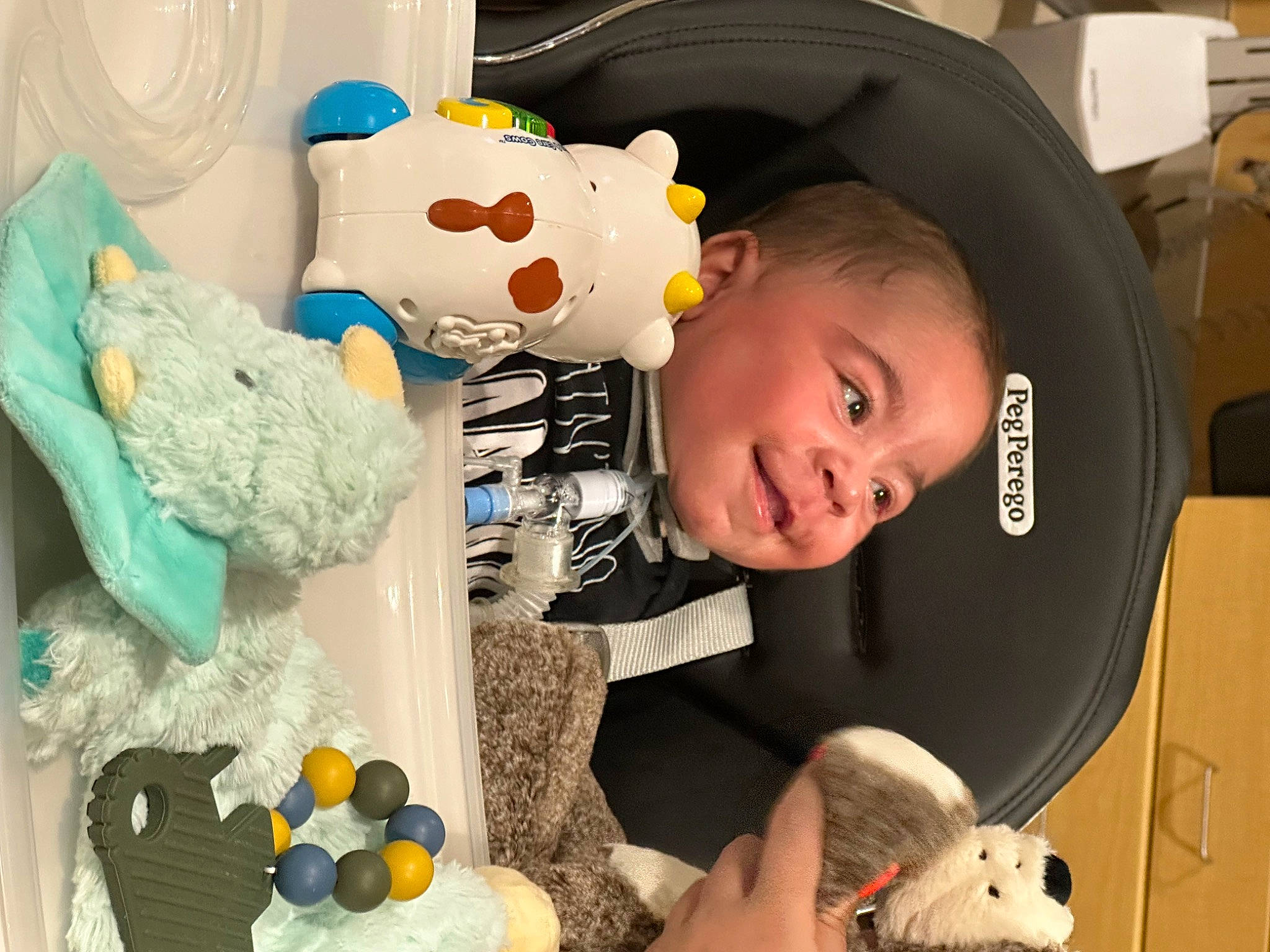 Kash is registered to the contest to win money with this photo: baby, baby_products, baby_toddler_clothing, baby_toys, child, comfort, fun, happy, joy, linens, pattern, person, plastic, play, room, smile, stuffed_toy, t_shirt, toddler, toy