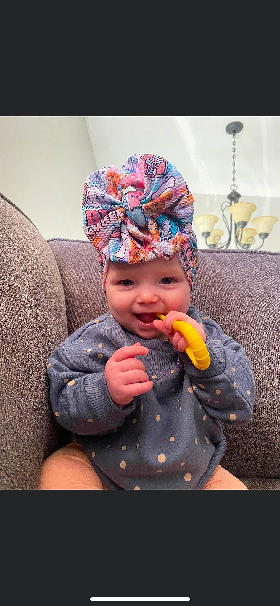 Bexley joined the competition — help win amazing prizes! baby, baby_products, baby_toddler_clothing, beanie, cap, child, comfort, costume_hat, fashion_accessory, fun, happy, headwear, knit_cap, outerwear, pattern, person, personal_protective_equipment, purple, room, sitting