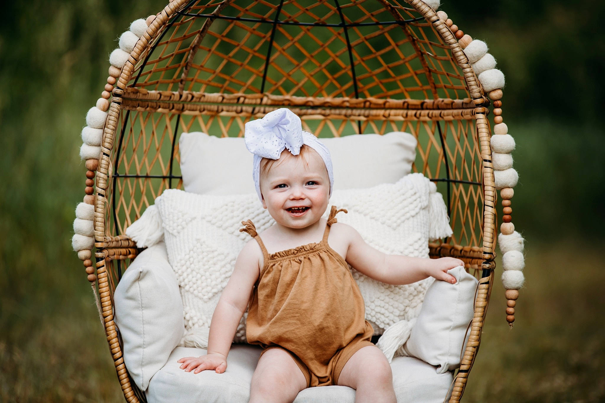 Bexley joined the competition — help win amazing prizes! baby, baby_products, baby_toddler_clothing, child, comfort, event, fashion_accessory, flash_photography, fun, grass, happy, headwear, joy, leisure, people_in_nature, person, portrait_photography, product, sitting, smile