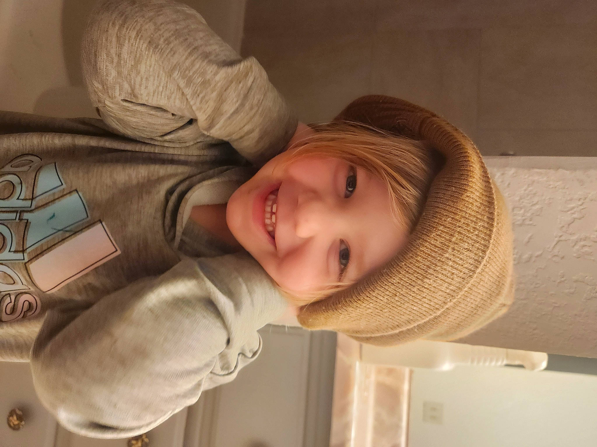 Dallas is registered to the contest to win money with this photo: baby, cap, child, chin, comfort, eye, facial_expression, fashion_accessory, fun, happy, hat, headgear, headwear, human, joy, mammal, nose, person, skin, smile