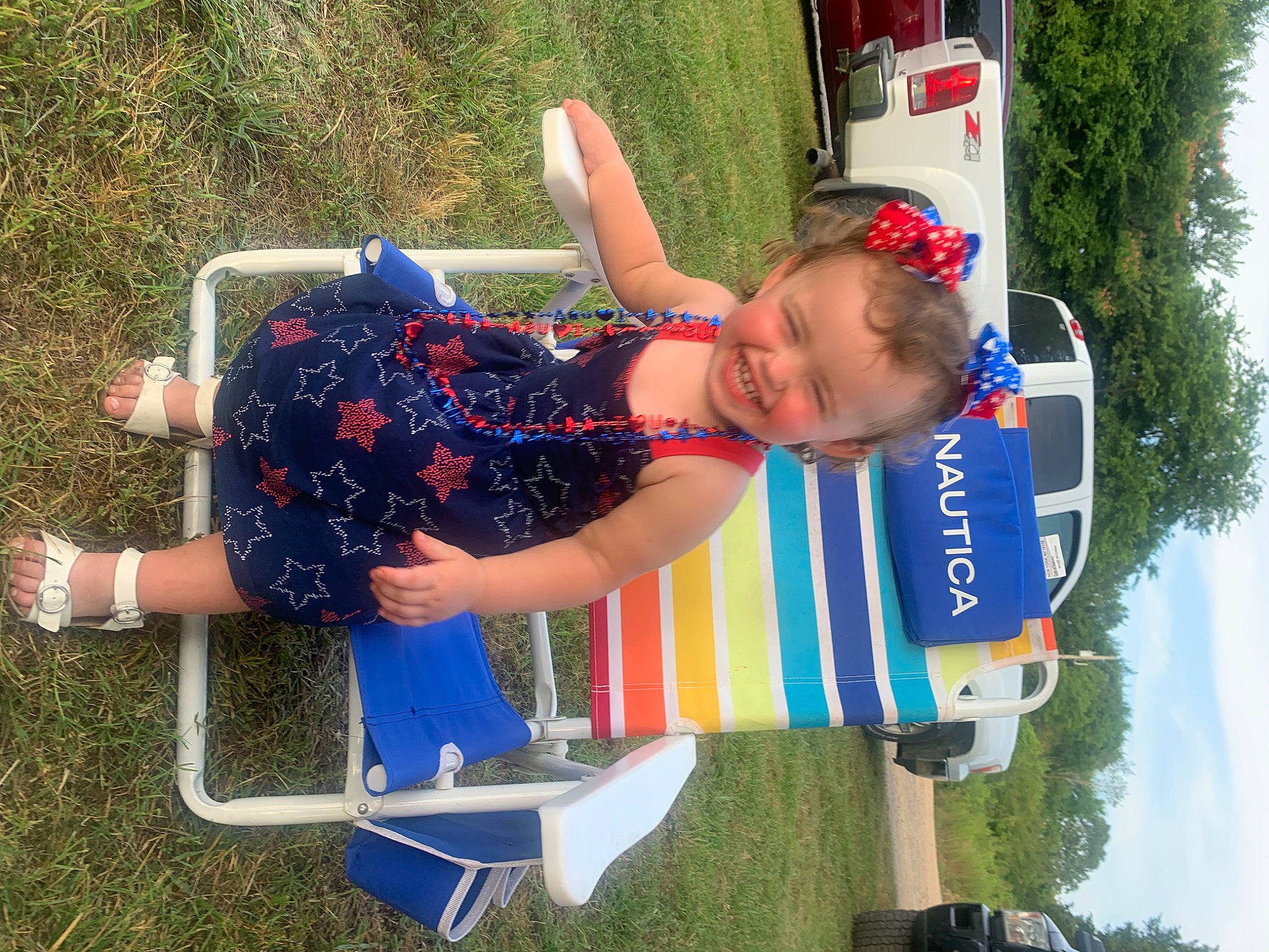 Sage is registered to the contest to win money with this photo: baby_toddler_clothing, child, elbow, electric_blue, fun, happy, joy, leisure, person, plant, play, pole, recreation, shorts, sky, smile, toddler, tree