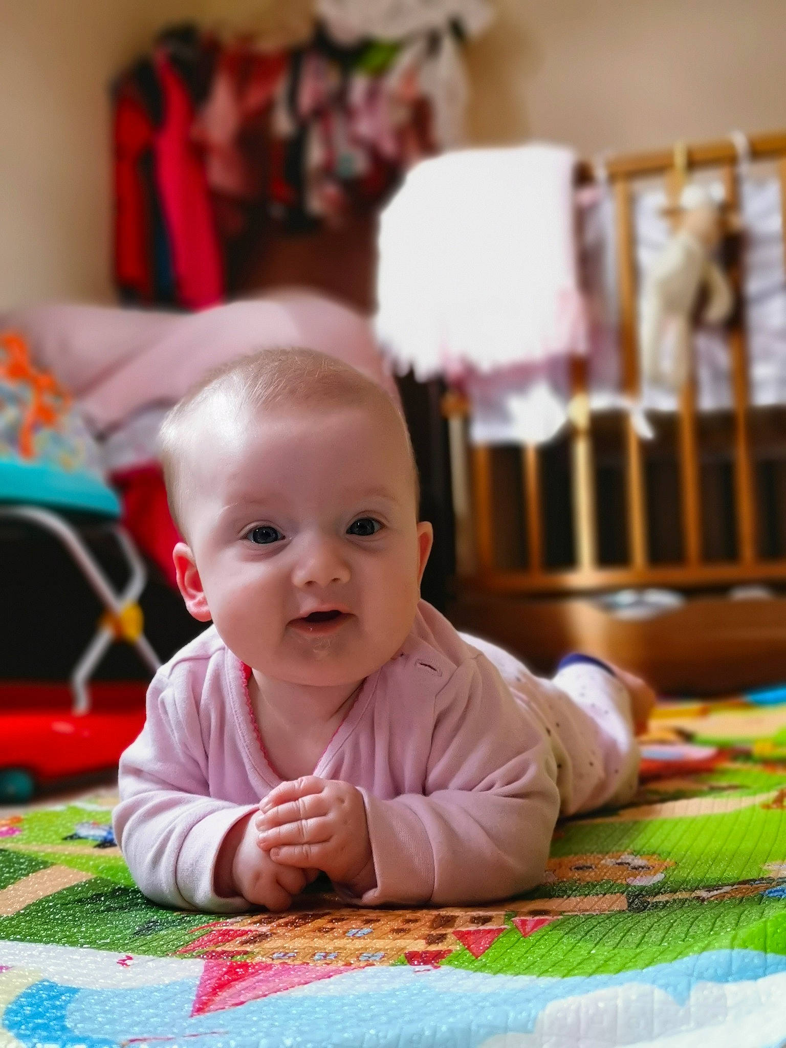 Esmee is registered to the contest to win money with this photo: baby, child, crawling, person, play, room, sitting, smile, toddler, tummy_time