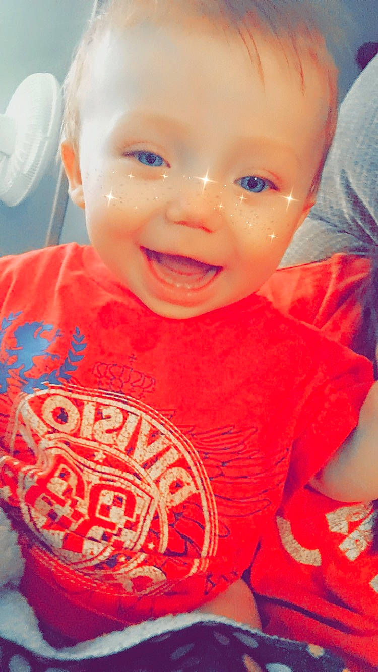 Weston joined the competition — help win amazing prizes! baby, cheek, chin, cool, eyebrow, finger, forehead, happy, human_body, iris, lip, mouth, muscle, neck, nose, orange, person, pink, skin, sleeve