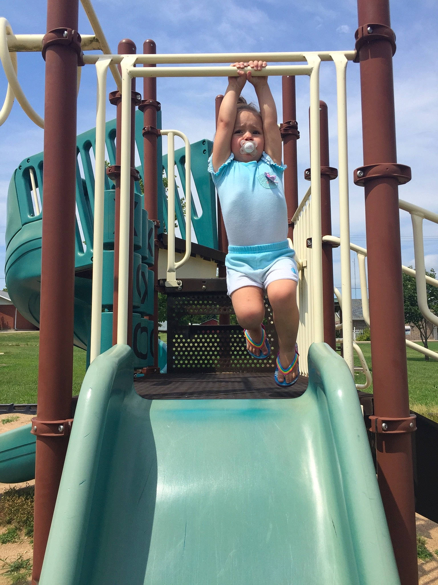 Whisper is registered to the contest to win money with this photo: child, chute, city, fun, human_settlement, leisure, outdoor_play_equipment, person, play, playground, playground_slide, public_space, recreation, toddler, vacation