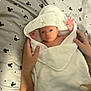 Elias And Romeo is registered to the contest to win money with this photo: baby, towel, hooded_towel, bed, mickey_mouse, pattern, hands, person, infant, newborn, cute, blanket, soft, child, resting, sleepwear, comfort, indoor, portrait, baby_wrapped