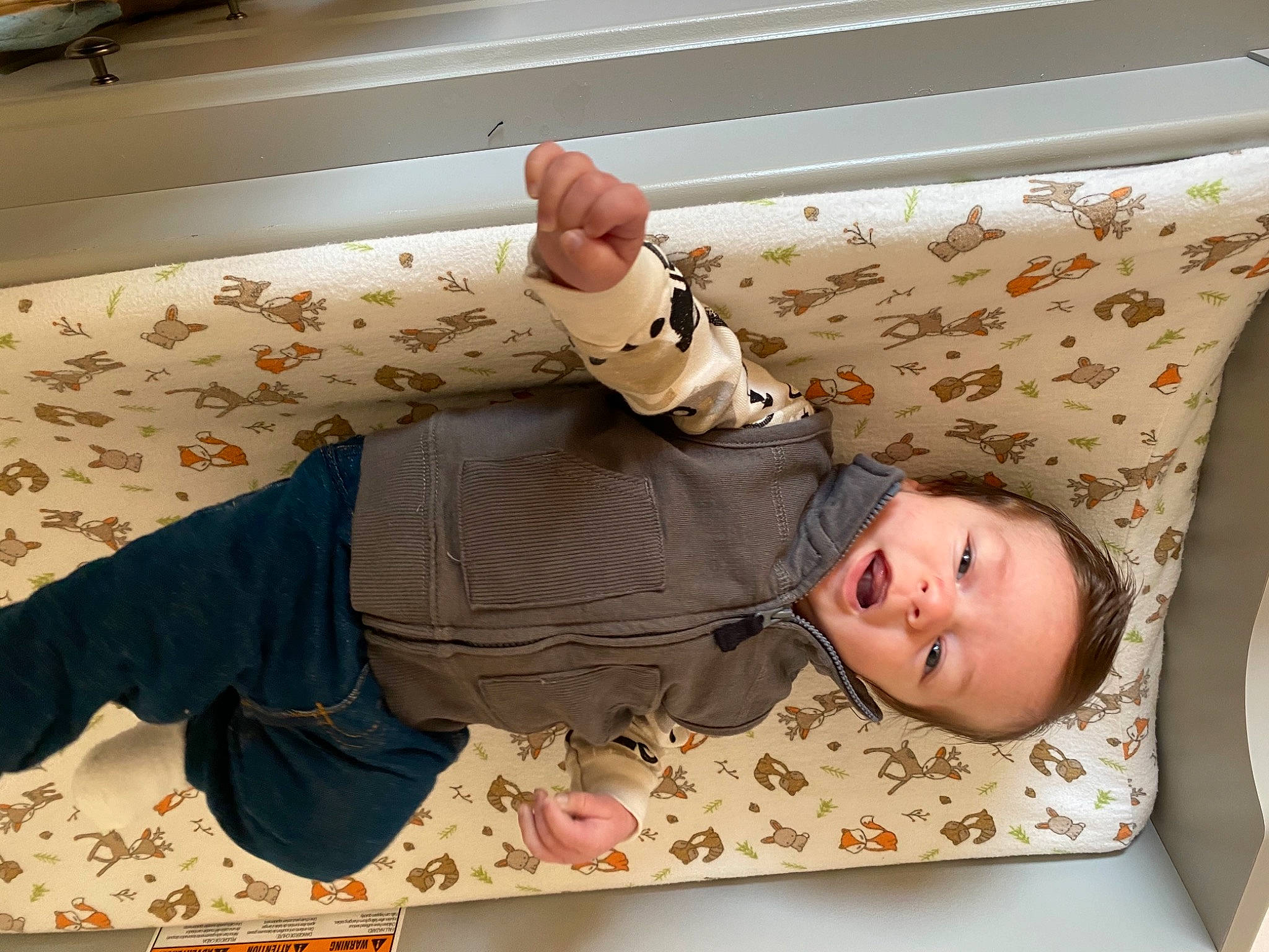 Caden is registered to the contest to win money with this photo: baby, baby_safety, baby_toddler_clothing, child, comfort, finger, flooring, foot, gesture, hardwood, human_leg, linens, pattern, person, room, sleeve, textile, thumb, toddler, wood