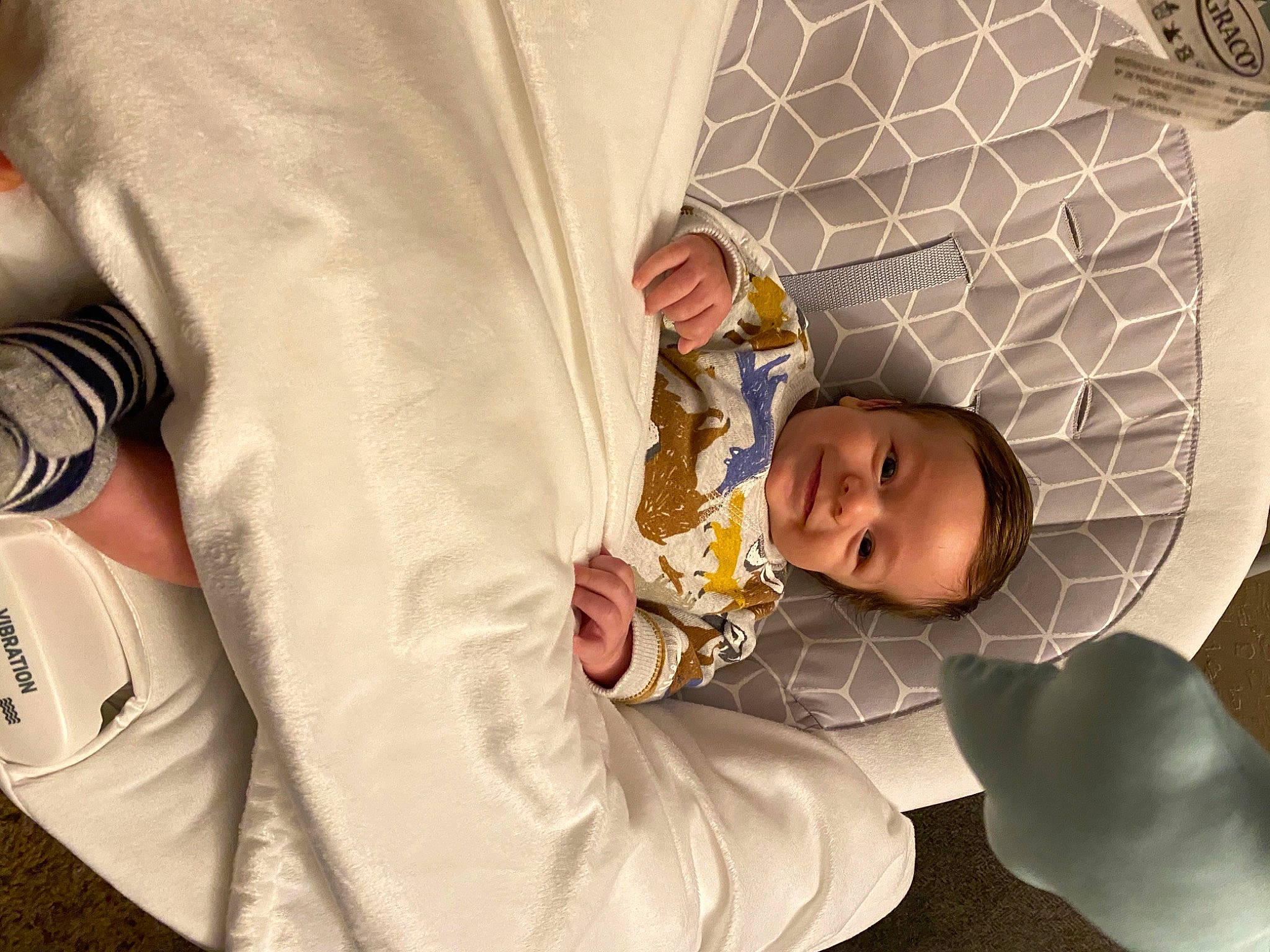 Caden is registered to the contest to win money with this photo: baby, baby_products, baby_toddler_clothing, child, comfort, facial_expression, flash_photography, fun, happy, joy, person, room, sitting, toddler, white