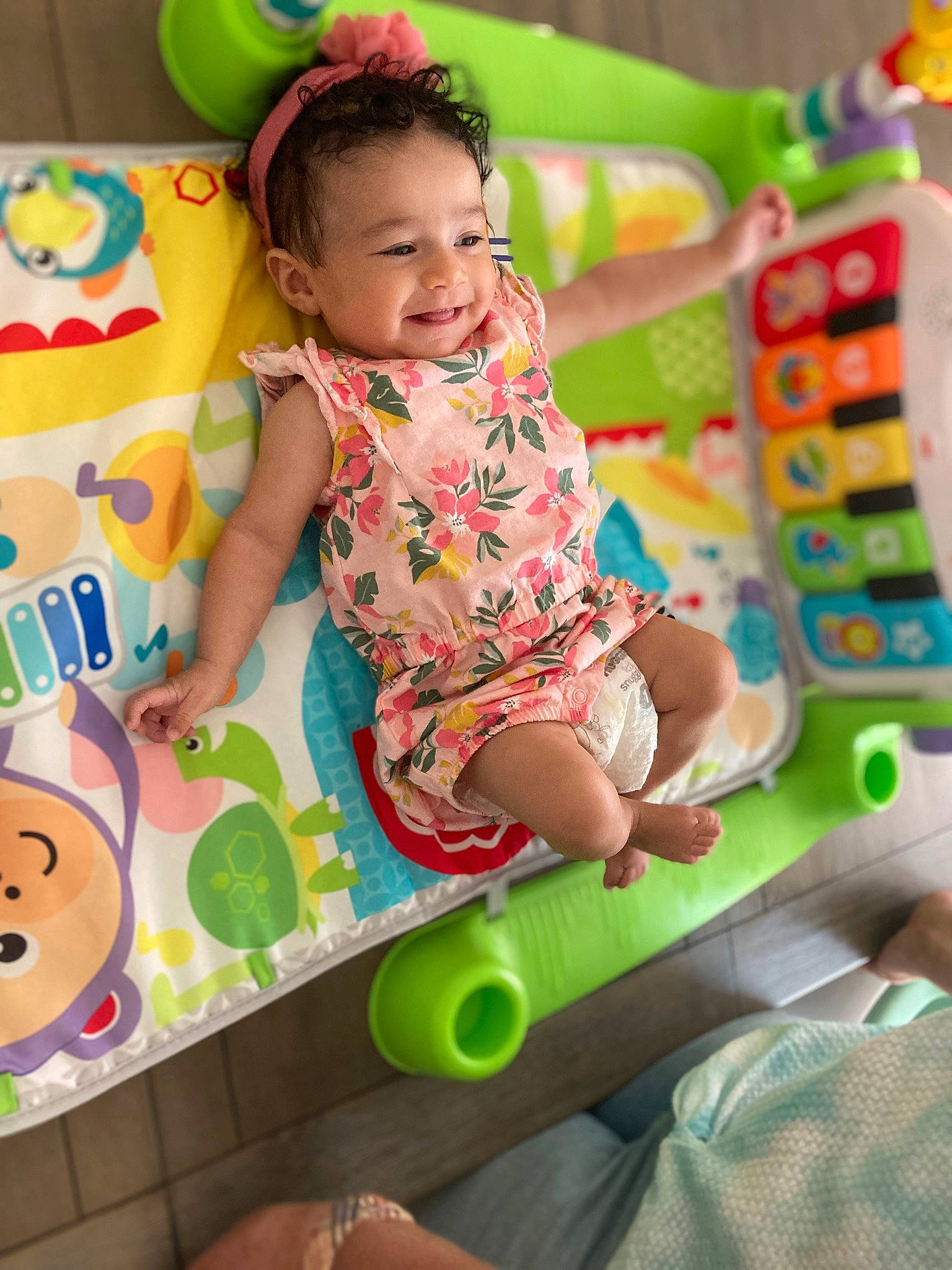 Amelia Rose joined the competition — help win amazing prizes! baby, baby_playing_with_toys, baby_products, baby_toddler_clothing, baby_toys, child, event, facial_expression, fun, green, happy, joy, leisure, person, play, recreation, sitting, smile, snapshot, toddler