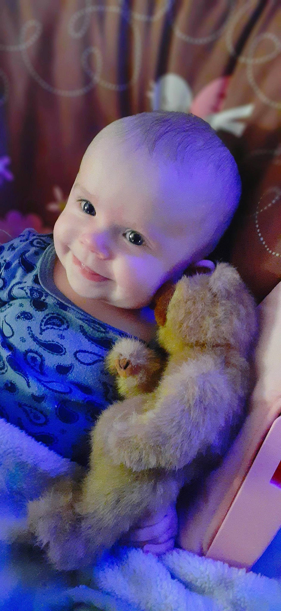Zenna Rene is registered to the contest to win money with this photo: baby, cheek, child, eye, face, fur, head, iris, lavender, nose, person, purple, skin, smile, teddy_bear, toddler, toy, violet