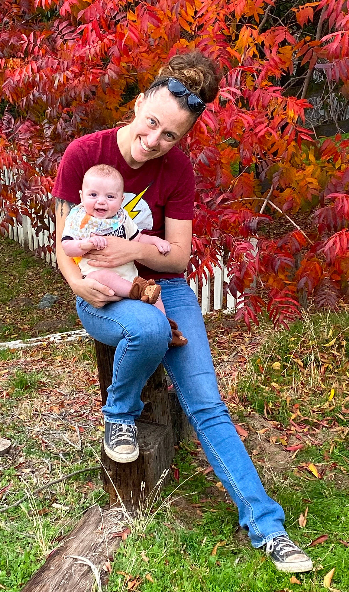 Donald is registered to the contest to win money with this photo: baby, boot, child, deciduous, fun, garden, grass, happy, jeans, joy, leaf, leisure, natural_landscape, people_in_nature, person, photograph, plant, sitting, smile, sneakers