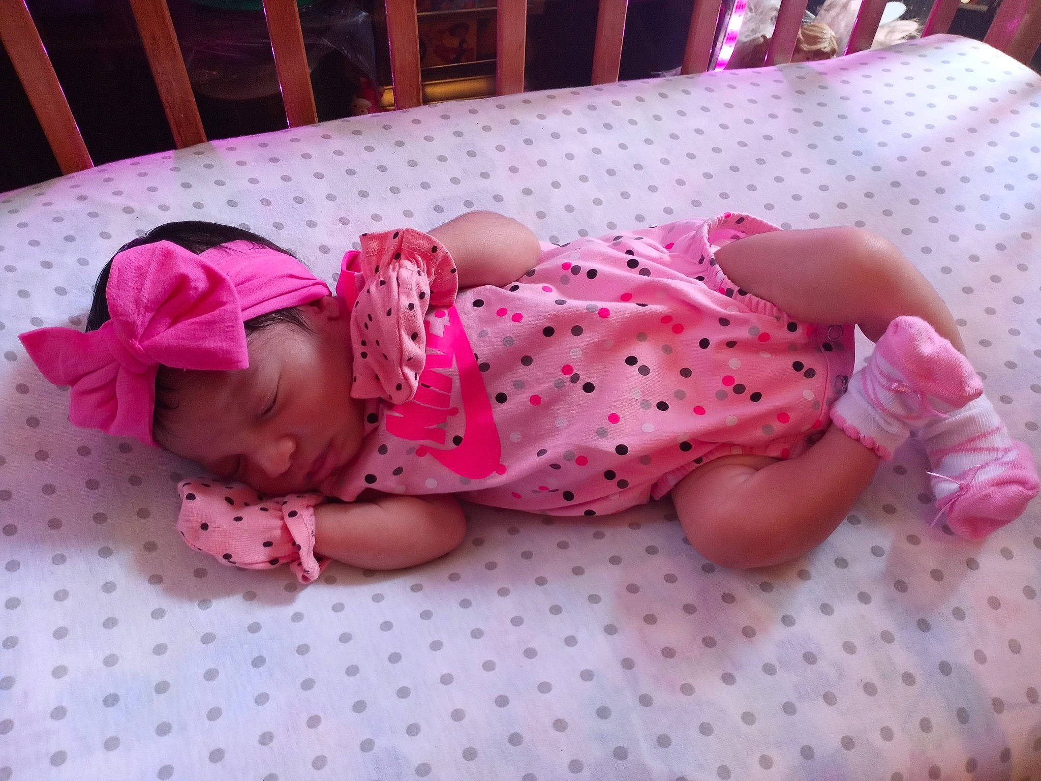 Icely'S Alexandra Aguilar is registered to the contest to win money with this photo: baby, baby_products, baby_toddler_clothing, bed, bedtime, child, design, headwear, linens, nap, pattern, person, pink, polka_dot, product, textile, toddler