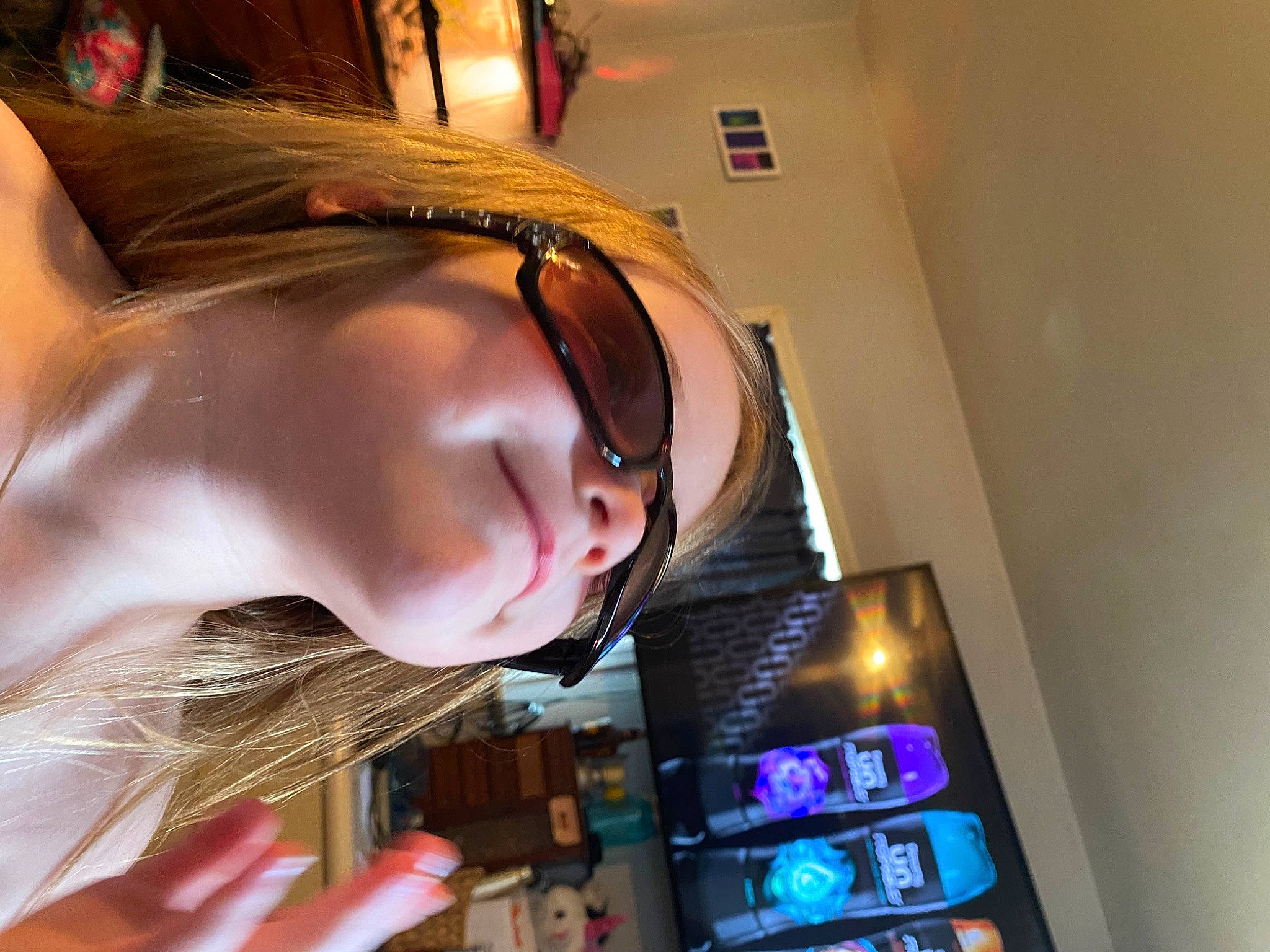 Madalyn is registered to the contest to win money with this photo: audio_equipment, bangs, brown_hair, ear, eye, eyebrow, eyelash, eyewear, fashion_accessory, flash_photography, fun, gadget, hair_coloring, hime_cut, lip, long_hair, magenta, person, personal_protective_equipment, selfie