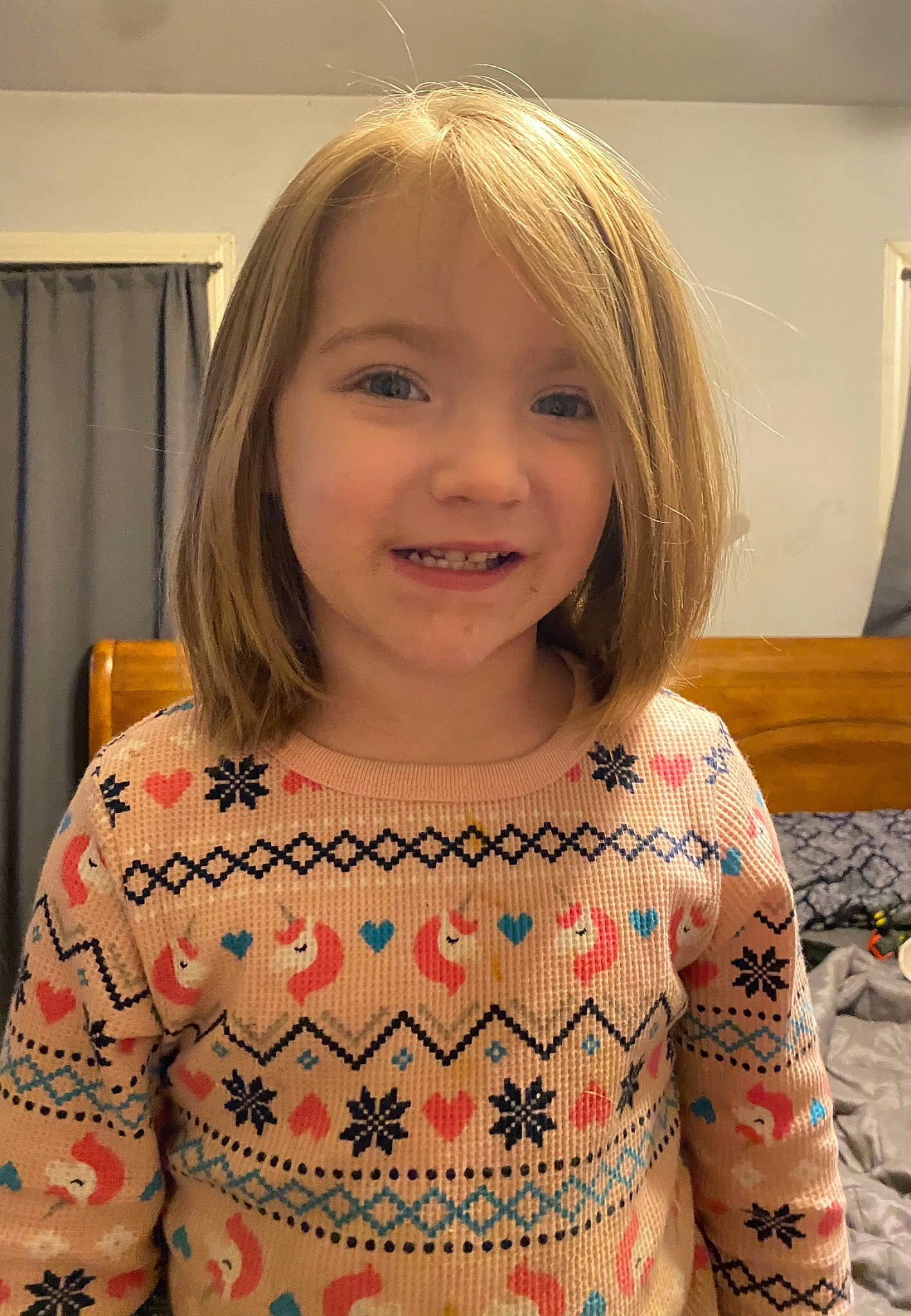 Madalyn is registered to the contest to win money with this photo: baby_toddler_clothing, bangs, blond, brown_hair, cheek, child, curtain, eyebrow, eyelash, fun, hair, happy, iris, joy, layered_hair, pattern, person, skin, sleeve, smile