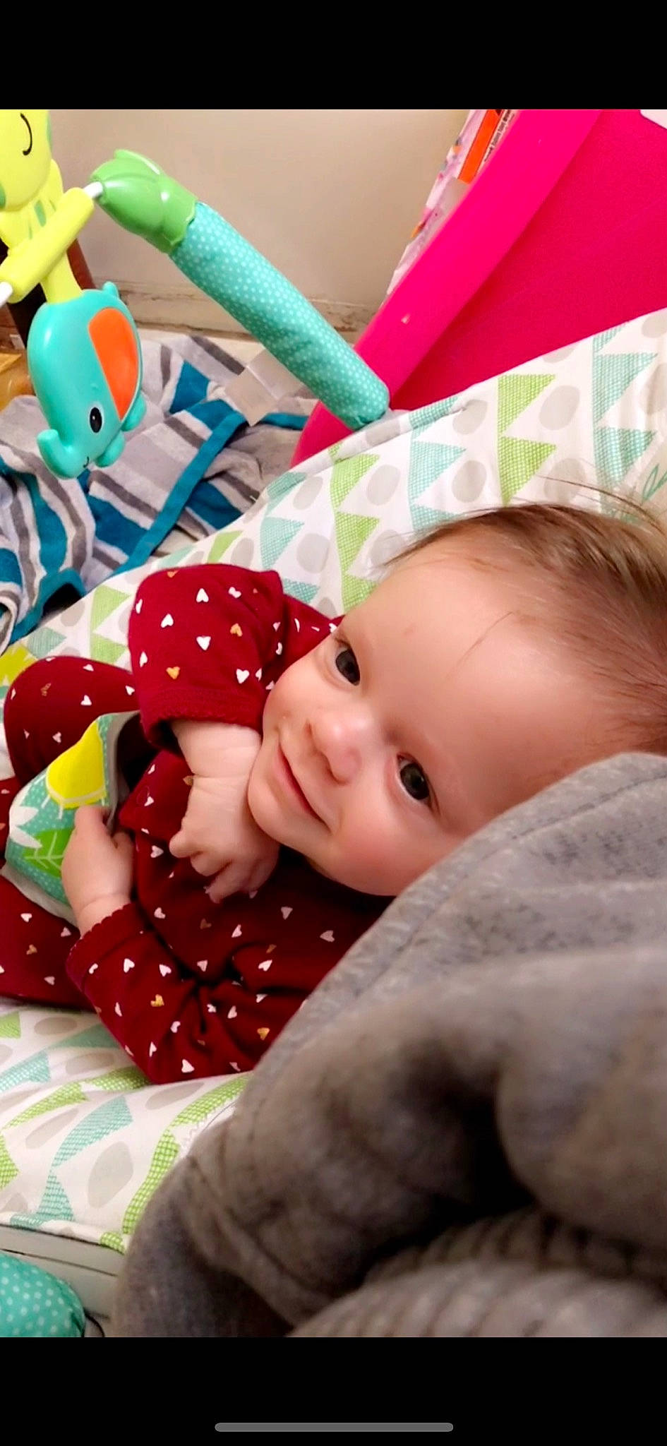 Kinsley is registered to the contest to win money with this photo: baby, baby_toddler_clothing, cheek, child, comfort, face, facial_expression, fun, happy, head, holiday, linens, pattern, person, pink, plaid, skin, sleeve, smile, textile