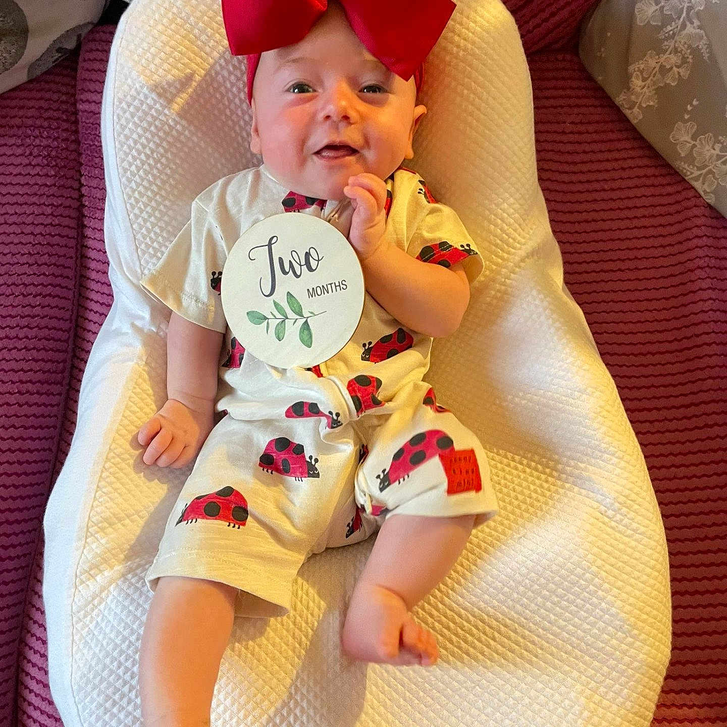 Aurora joined the competition — help win amazing prizes! baby, biting, blanket, clothing, couch, cushion, cutlery, eating, face, food, furniture, hat, head, homedecor, person, photography, portrait, sitting, spoon, t_shirt