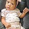 Victoria joined the competition — help win amazing prizes! baby, infant, child, portrait, car_seat, headband, bow, pink_clothing, onesie, patterned_clothing, sitting, indoors, face, eyes, wide_eyed, hand, smiling, soft_fabric, gray_background, photography