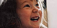 Julinne participe au concours pour gagner de l'argent avec cette photo : child, smile, happy, face, portrait, hair, teeth, light, joy, expression, cute, closeup, person, indoors, childhood, emotion, laugh, young, warm, natural_light