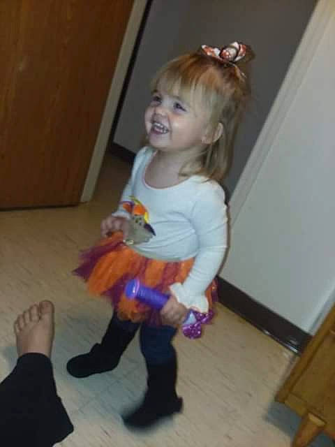 Lillian joined the competition — help win amazing prizes! baby, cheek, child, costume, dress, ear, fun, iris, person, play, skin, smile, standing, toddler