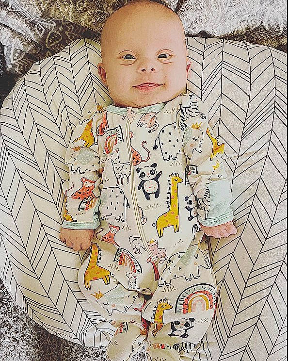 Benji is registered to the contest to win money with this photo: art, baby, baby_toddler_clothing, chair, child, circle, collar, comfort, dress_shirt, eye, hairstyle, happy, illustration, linens, pattern, person, sitting, sleeve, toddler, vintage_clothing