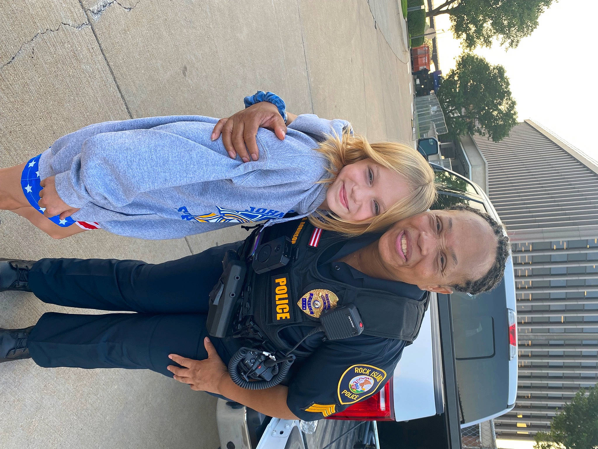 Hannah joined the competition — help win amazing prizes! automotive_exterior, electric_blue, family_car, fun, joy, motor_vehicle, official, person, plant, smile, t_shirt, travel, tree, uniform, vehicle_door, walking_shoe