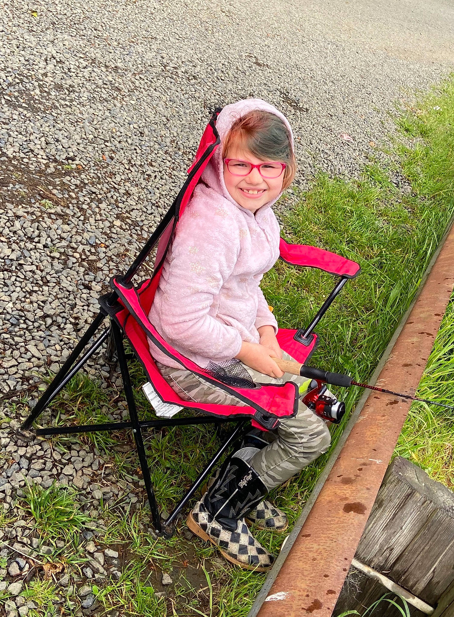 Adyson joined the competition — help win amazing prizes! baby_products, child, fun, grass, grass_family, joy, lawn, leisure, person, pink, plant, product, recreation, sitting, spring, vacation, vehicle