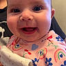 Gabriella joined the competition — help win amazing prizes! baby, smiling, infant, face, hand, clothing, onesie, pattern, colorful, person, cute, happy, child, portrait, skin, eyes, mouth, indoor, holding, human