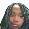 Amari is registered to the contest to win money with this photo: black_hair, braids, casual, child, close_up, expressionless, eyelashes, face, fashion, hair, head_and_shoulders, hoodie, indoor, neutral_expression, person, portrait, single_person, skin, young_female, young_person
