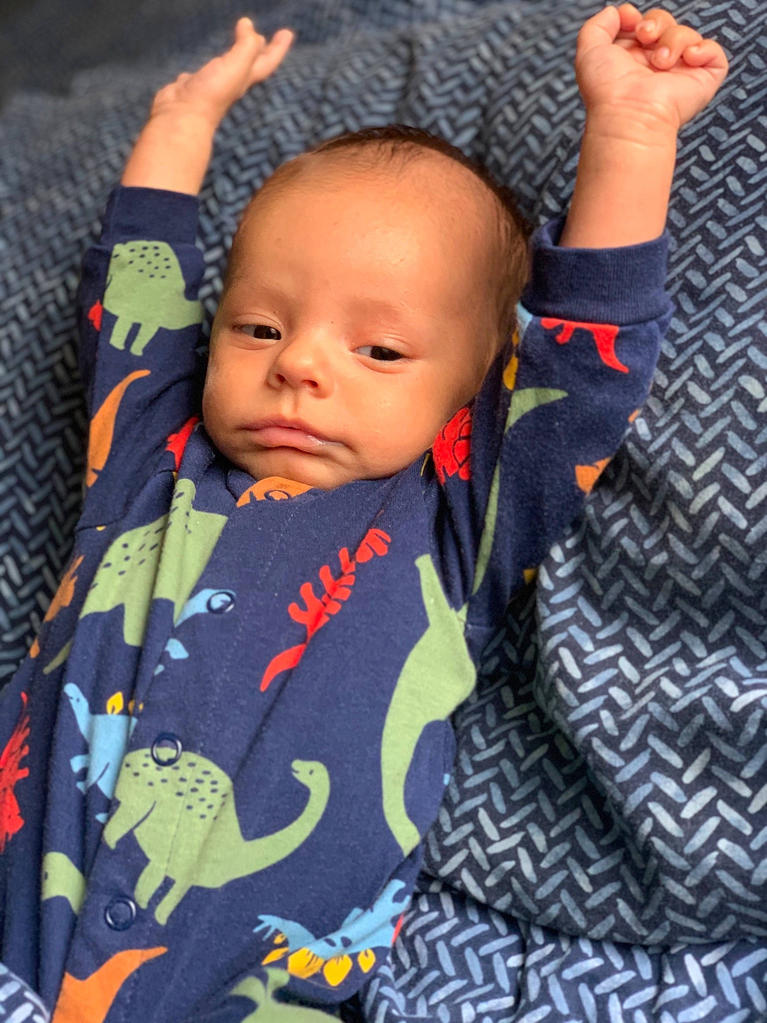 Javier is registered to the contest to win money with this photo: baby, baby_products, cheek, child, eye, face, finger, hand, head, nose, outerwear, pattern, person, plant, play, product, skin, toddler