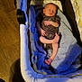 baby, bed, couch, cradle, crib, face, furniture, head, infantbed, newborn, person, wood