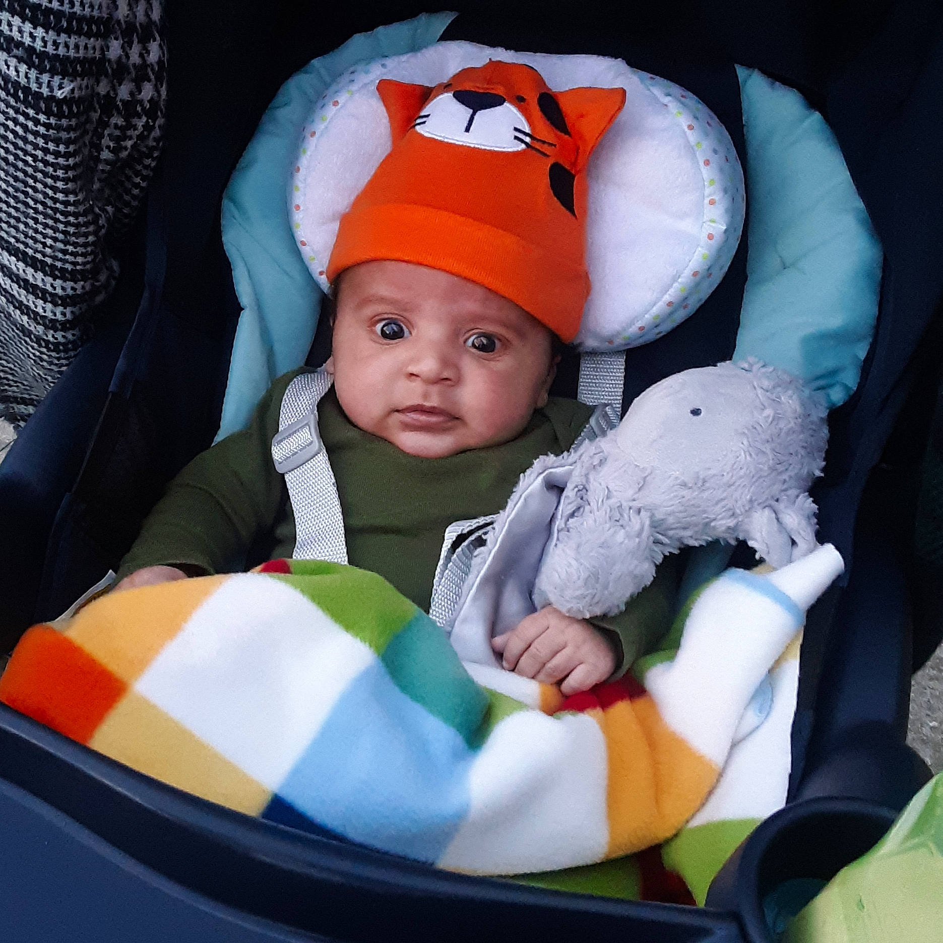 Jamison is registered to the contest to win money with this photo: baby, baby_carriage, baby_in_car_seat, baby_products, baby_safety, baby_sleeping, baby_toddler_clothing, beanie, cap, car_seat, cheek, child, comfort, headwear, knit_cap, lap, linens, person, product, sitting
