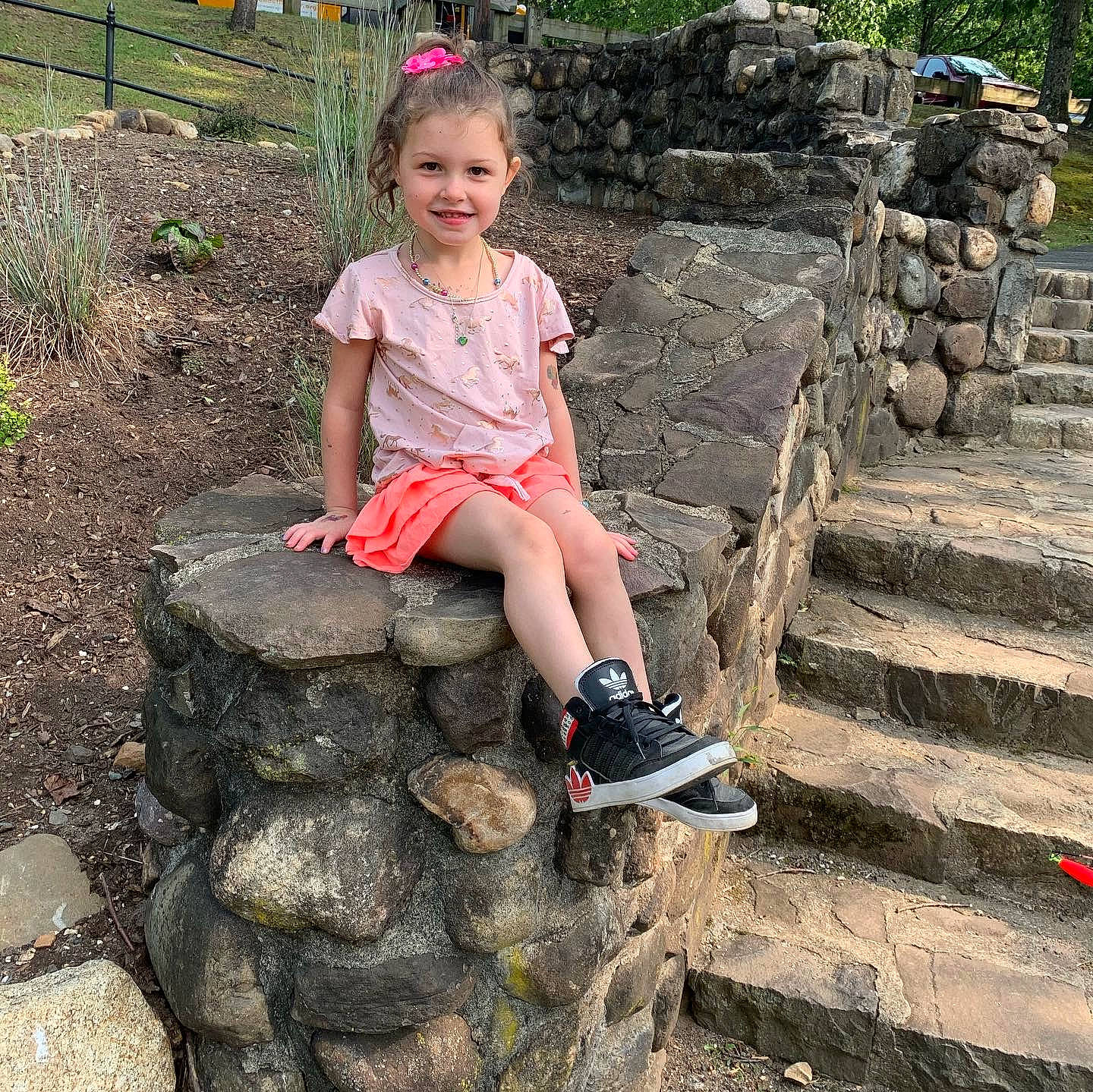 Haylee Grace joined the competition — help win amazing prizes! beauty, botany, child, footwear, joy, leg, leisure, person, photography, plant, play, recreation, rock, shoe, sitting, smile, stone_wall, summer, toddler, tree