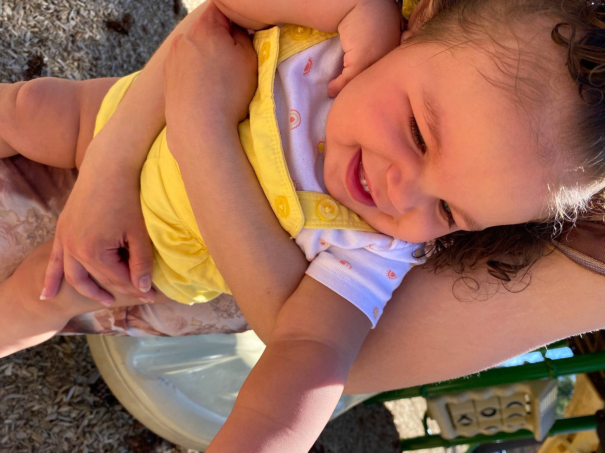 Rhea is registered to the contest to win money with this photo: baby, beauty, chest, eye, eyelash, finger, fun, grass, happy, human_leg, leisure, mouth, nail, people_in_nature, person, skin, smile, summer, thigh, toddler