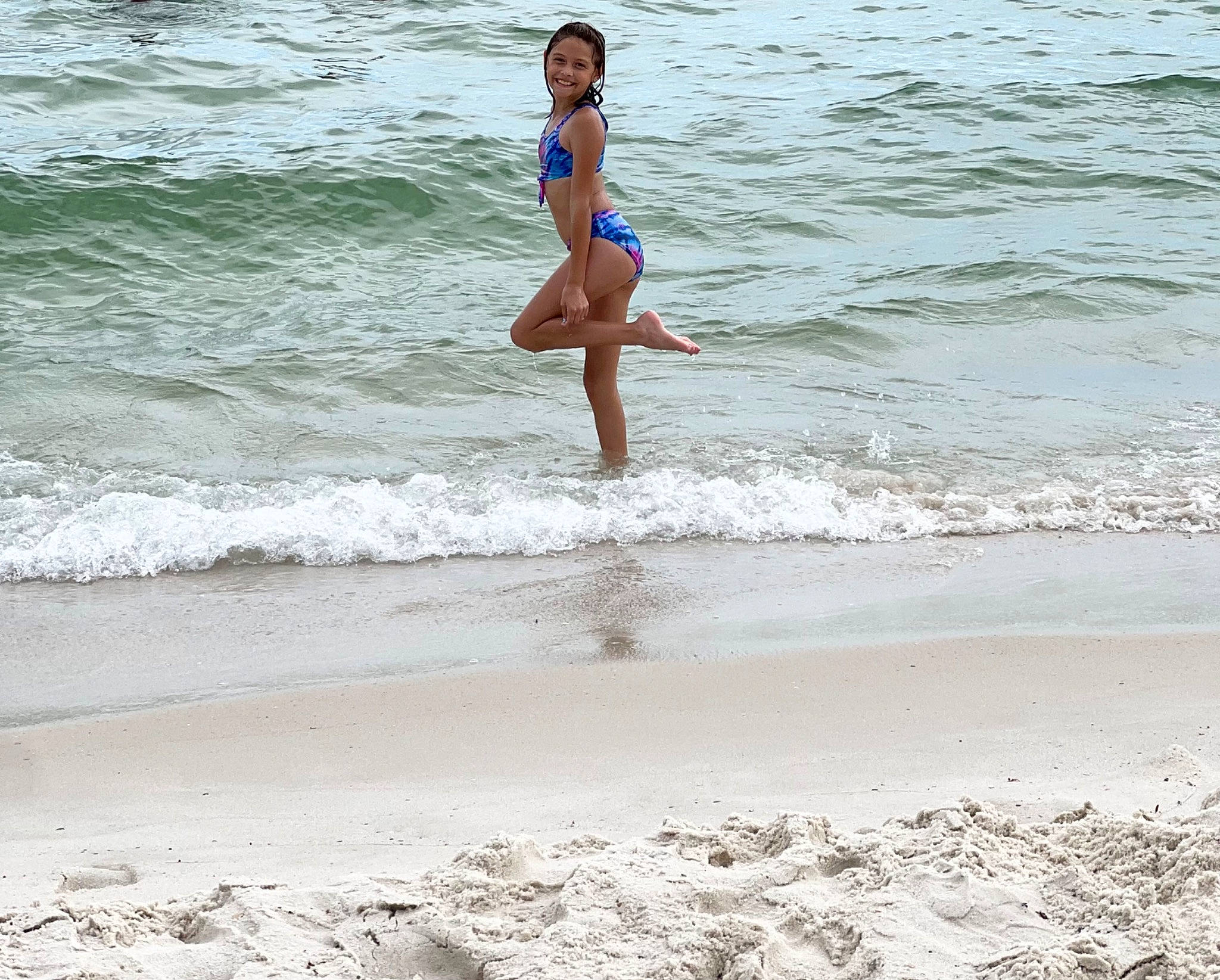 Leigha is registered to the contest to win money with this photo: barefoot, beach, body_of_water, brassiere, flash_photography, fun, happy, human_body, human_leg, joy, leg, leisure, people_in_nature, people_on_beach, person, shore, swimwear, thigh, undergarment, waist