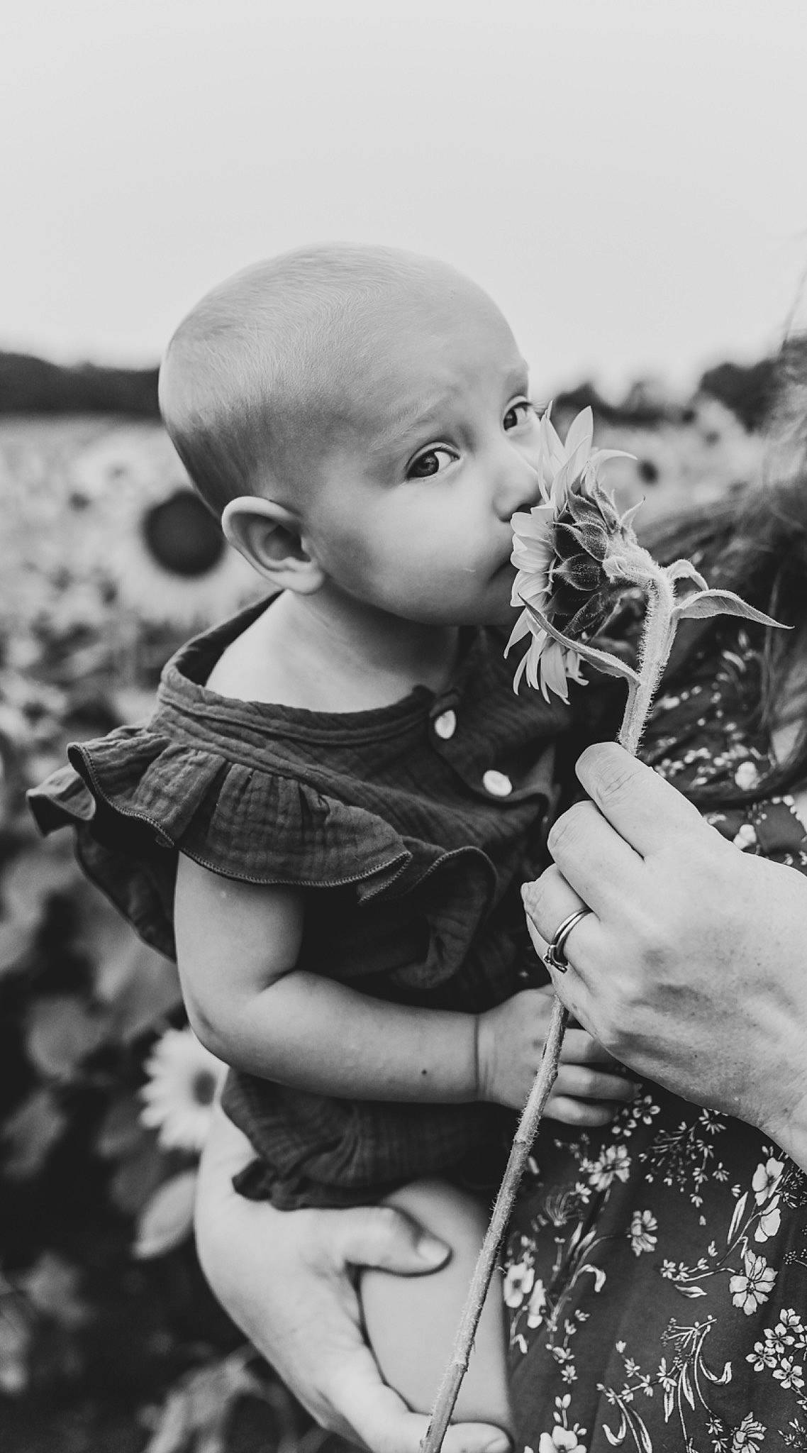 Blakeley joined the competition — help win amazing prizes! black, black_and_white, child, flower, gesture, grass, happy, monochrome, monochrome_photography, musical_instrument, people_in_nature, person, photograph, plant, sitting, sky, style, toddler, vintage_clothing, white