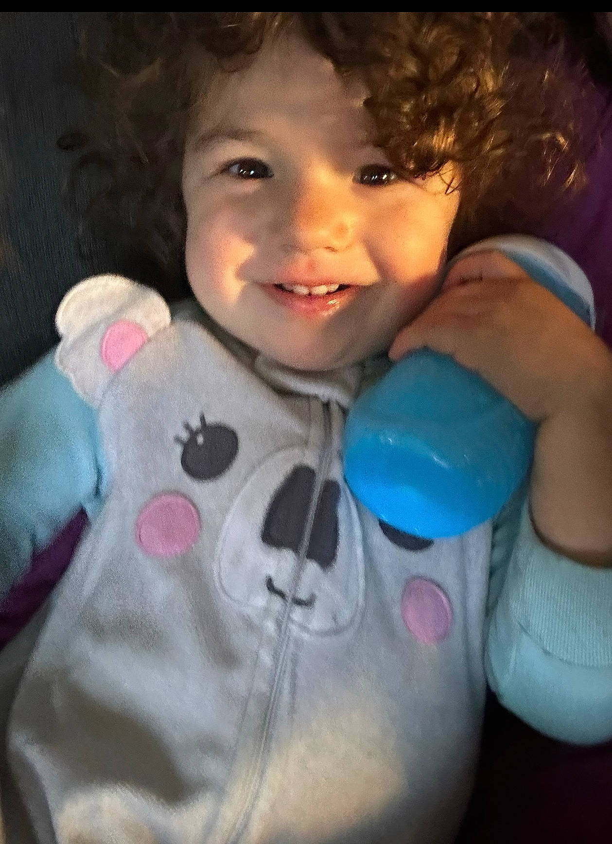 Corra is registered to the contest to win money with this photo: baby, baby_toddler_clothing, cheek, child, cool, electric_blue, finger, flash_photography, gesture, happy, human_body, joy, mammal, mouth, nose, person, pink, skin, sleeve, smile