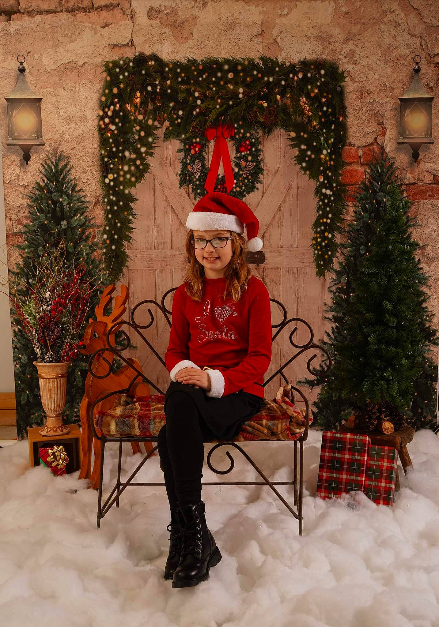 Aaliyah is registered to the contest to win money with this photo: boot, christmas_decoration, christmas_tree, clothing, event, flowerpot, freezing, fun, hat, headwear, holiday, human_body, joy, leisure, person, plant, smile, snow, tree, window