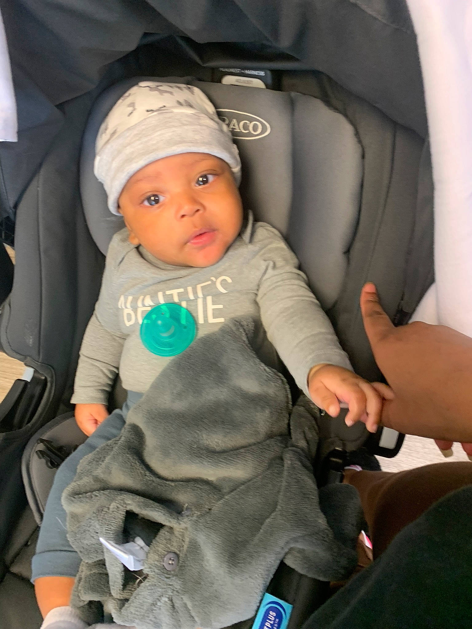 Apollo is registered to the contest to win money with this photo: auto_part, automotive_design, baby, baby_carriage, baby_in_car_seat, baby_products, baby_toddler_clothing, car_seat, car_seat_cover, child, comfort, family_car, fun, head_restraint, headwear, luxury_vehicle, motor_vehicle, person, seat_belt, sitting