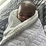 Darius Jr joined the competition — help win amazing prizes! baby, bed, bedding, blanket, child, comfort, cozy, face, indoor, infant, light, pattern, peaceful, rest, sleeping, soft, texture, toddler, wrapped, young