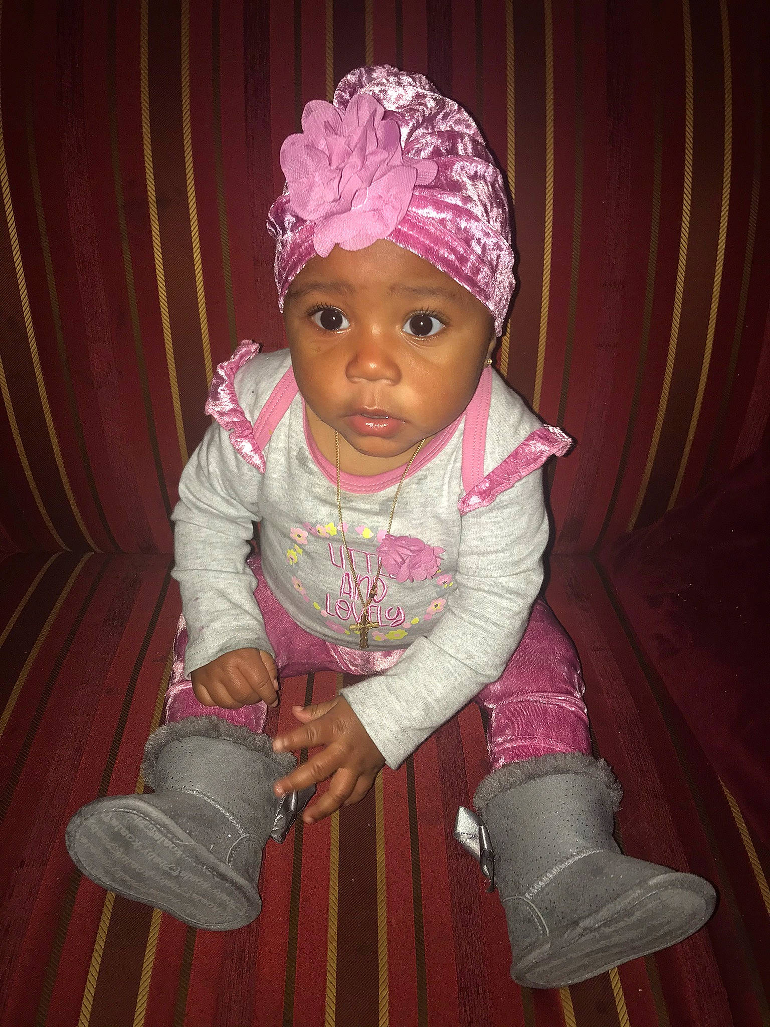 Skylah joined the competition — help win amazing prizes! baby, baby_toddler_clothing, cap, cheek, child, costume, costume_hat, curtain, event, fashion_accessory, flooring, happy, headband, headpiece, headwear, human_body, magenta, outerwear, person, pink